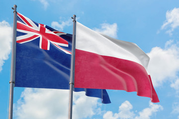 Poland and Anguilla flags waving in the wind against white cloudy blue sky together. Diplomacy concept, international relations.