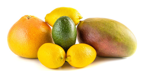 Citrus on a white background, grapefruit, lemon, mango and avocado.