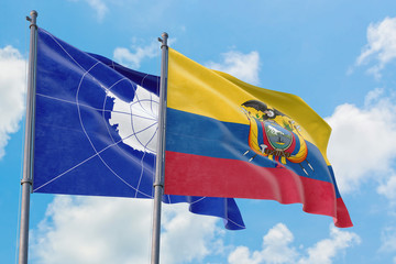 Ecuador and Antarctica flags waving in the wind against white cloudy blue sky together. Diplomacy concept, international relations.