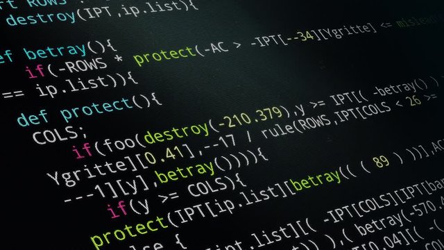 Source code scrolling 4K Animation. Program code development process. Display or monitor close up video. Pixel grid screen. Data security. Depth of Field effect.