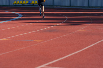 Stadium track and running athlete with disability