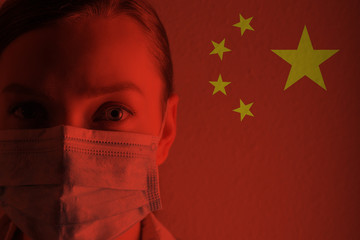 Girl in a mask against the background of the Chinese flag, coronavirus, danger and threat, outbreak of a dangerous virus. Photo for articles, news.