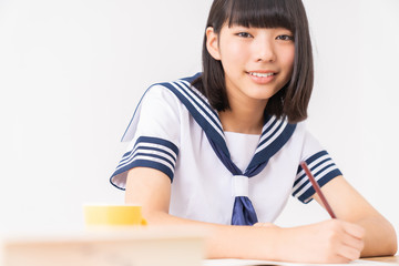 Naklejka premium 勉強する女の子 制服