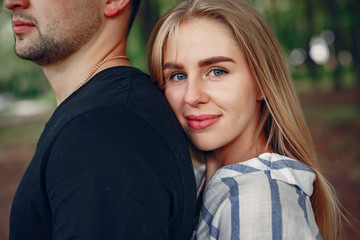 Couple in a forest, warm summer, lovely weather