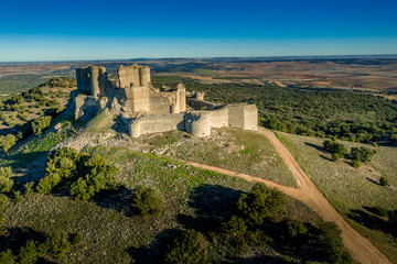 Aerial view of medieval castle ruin Pueble de Almenara in Cuenca Spain with convenctric walls,...