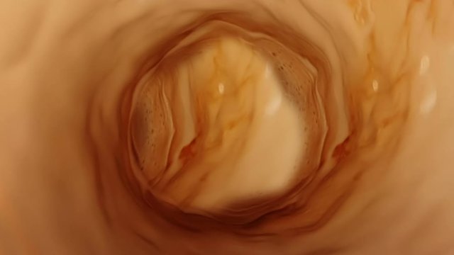 top of view of super slow motion shot of fresh cream milk with coffee vortex, concept of nutrition