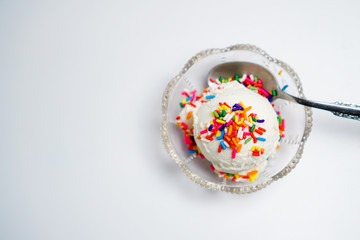 Vanilla ice cream with rainbow sprinkles