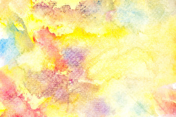 yellow watercolor paint on paper