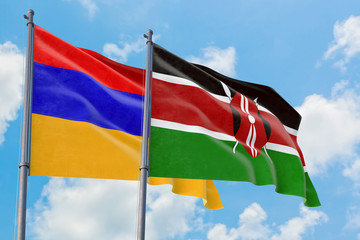 Kenya and Armenia flags waving in the wind against white cloudy blue sky together. Diplomacy...
