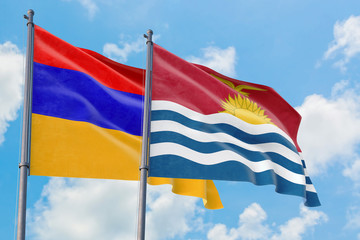 Kiribati and Armenia flags waving in the wind against white cloudy blue sky together. Diplomacy concept, international relations.