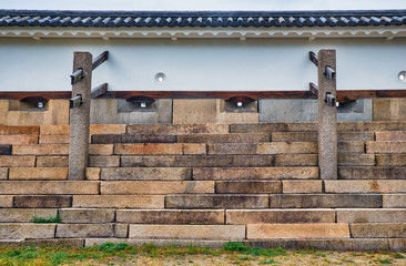 The stone defensive wall with loopholes in Osaka Castle. Osaka. Japan © Serg Zastavkin