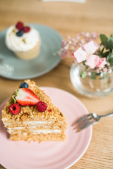 Delicious piece of cake on a plate in a cafe
