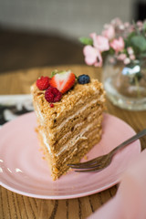 Delicious piece of cake on a plate in a cafe