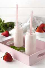 yogurt with strawberries in glass jars