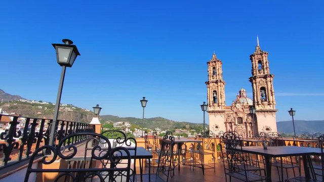 Panoramic view of Taxco hills and Church of Santa Prisca de Taxco (The Parroquia de Santa Prisca) in the central plaza of Taxco historic center