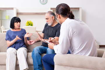 Old couple visiting psychiatrist doctor