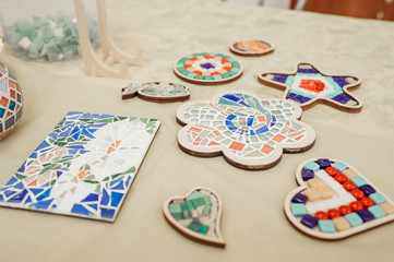 hobby and hobby collecting paintings and objects from colorful ceramic mosaics in small pieces