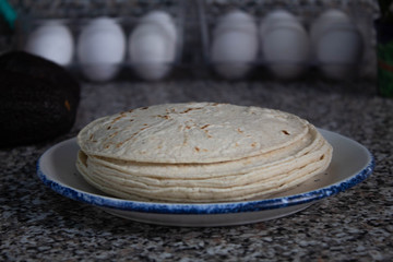 Tortilla pile in.a plate at the kitchen