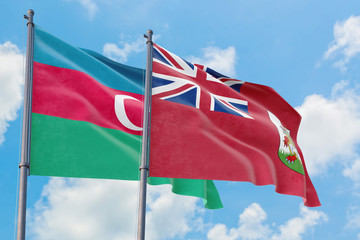 Bermuda and Azerbaijan flags waving in the wind against white cloudy blue sky together. Diplomacy concept, international relations.