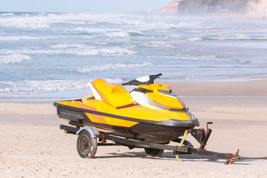 Jet Ski On A Boat Trailer On A Sandy Beach