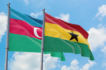 Ghana and Azerbaijan flags waving in the wind against white cloudy blue sky together. Diplomacy concept, international relations.