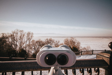 looking through binoculars,  Khabarovsk, Russia.