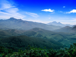 The Scenic beauty of Munnar tea plantation in Southern part of India, Kerala, with Western Ghats mountains region.