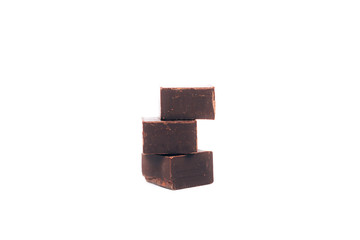 Dark Chocolate pieces isolated on white. chocolate bar.