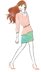 ピンクのニットを着た女性が振り向く