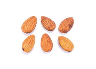Baked salted almonds on isolated white background.