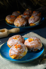 Fine Berlin donuts with jam filling and icing