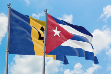 Cuba and Barbados flags waving in the wind against white cloudy blue sky together. Diplomacy concept, international relations.