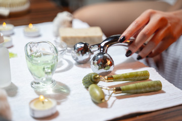 Woman is using new massagers for facebuilding