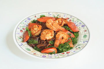 Stir fried Noodle with black soy sauce.