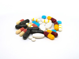 A lot of Pills on white background.