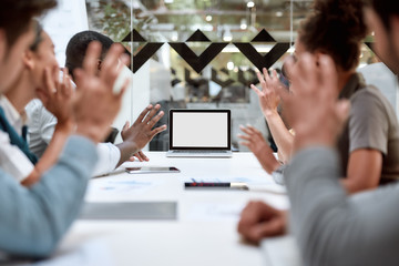 Online meeting. Group of business people having video conference while sitting in the office....