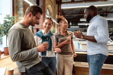 The family you make here will be your biggest fortune. Creative multi ethnic business group at lunch
