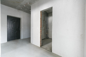interior of the apartment without decoration in gray colors