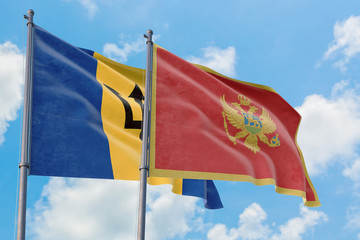 Montenegro and Barbados flags waving in the wind against white cloudy blue sky together. Diplomacy concept, international relations.