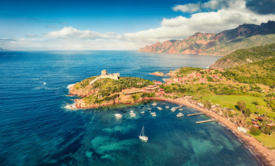 View from flying drone. Fantastic morning view of Port de Girolata - place, where you can't get by car. Spectacular spring scene of Corsica island, France, Europe. Amazing Mediterranean seascape.