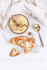 French puree soup with parsnip, soft cheese baguette.