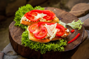Smoked Sausage Sandwich with Cherry Tomatoes