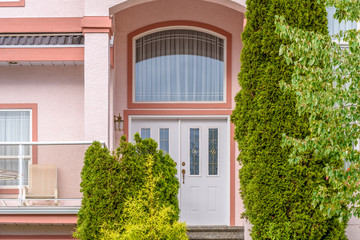 A nice entrance of a luxury house over outdoor landscape