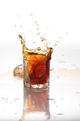 Glasses of scottish whiskey with ice cubes