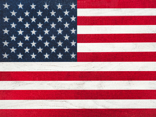 American Flag lying on the table. Place for your inscriptions. Top view, close-up. National holiday concept