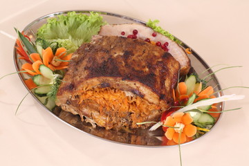 Baked pork with lingonberries and carrots with vodka