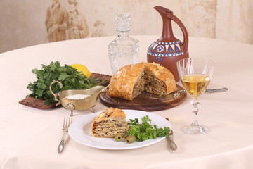 puff pastry pie with chicken and mushrooms and the brandy in the glass © Pretti