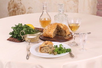 puff pastry pie with chicken and mushrooms and the brandy in the glass © Pretti