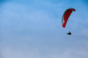Man enjoying the sky view through parachute glide