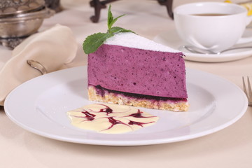 Berry cake with tea with mint and lemon